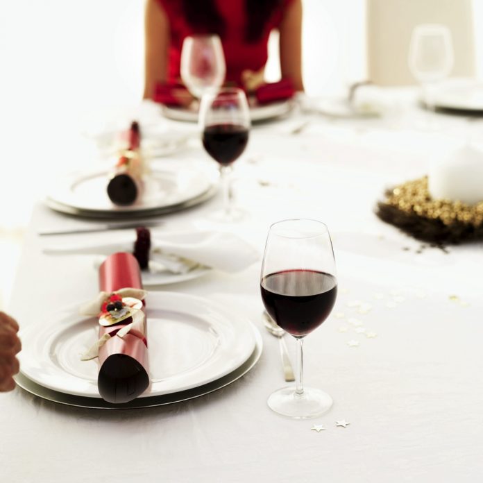 Red Wine and Christmas Cracker at the Dinner Table